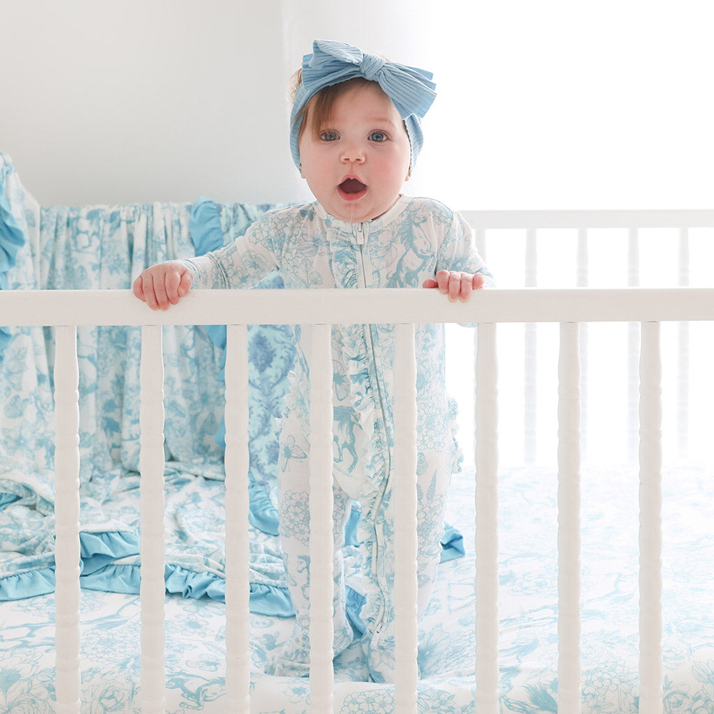 baby standing up in crib