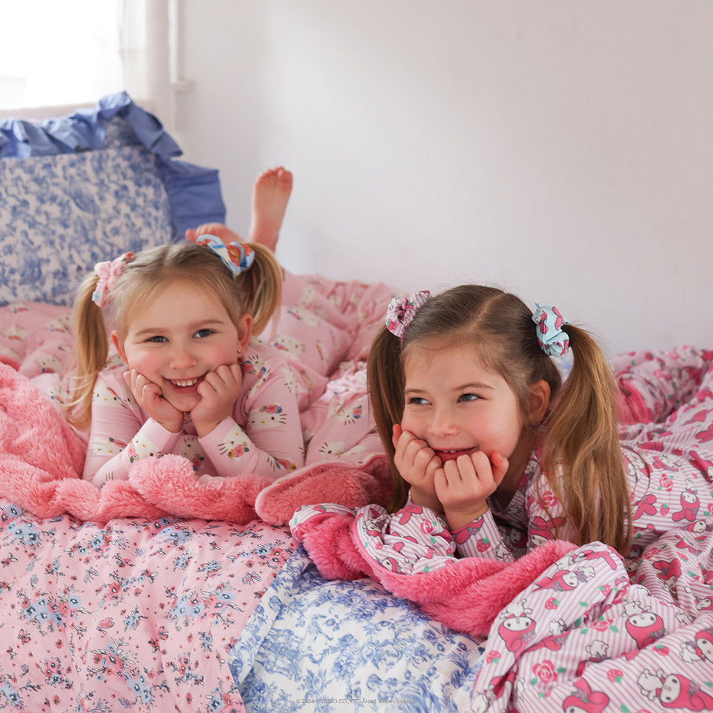 two girls on bed