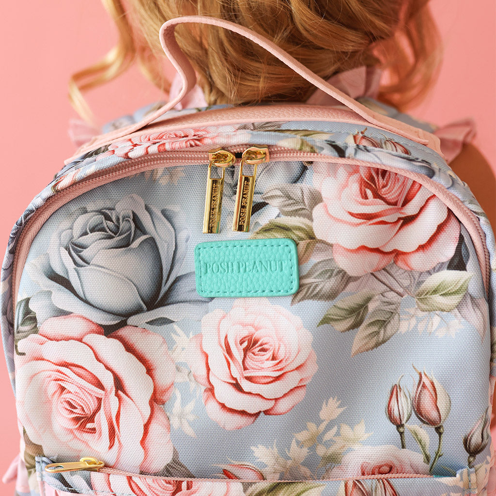 Betsey purchases Johnson Floral Mini Backpack