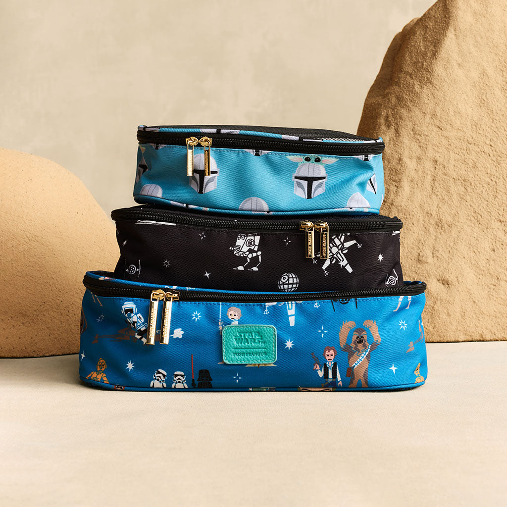 Pack of 3 stacked travel cubes with Star Wars print against a textured background.