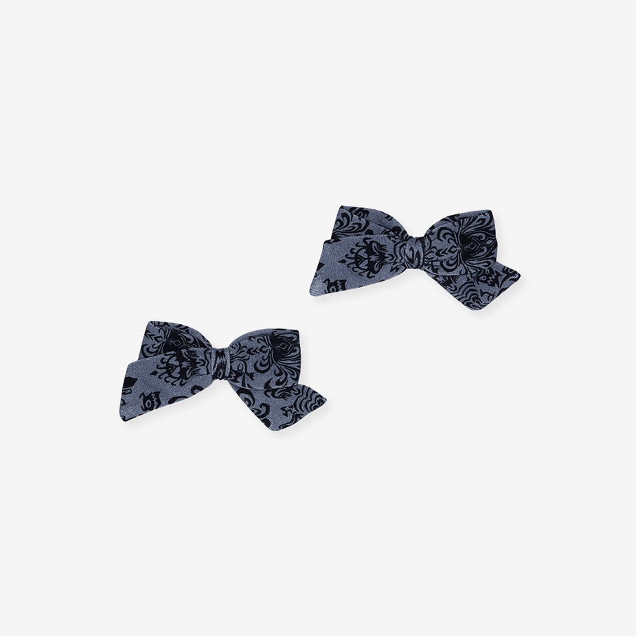 Posh Peanut Disney The Haunted Mansion Wallpaper Mini Bow Hair Clips, a pair of small bows in the dark damask-inspired print.