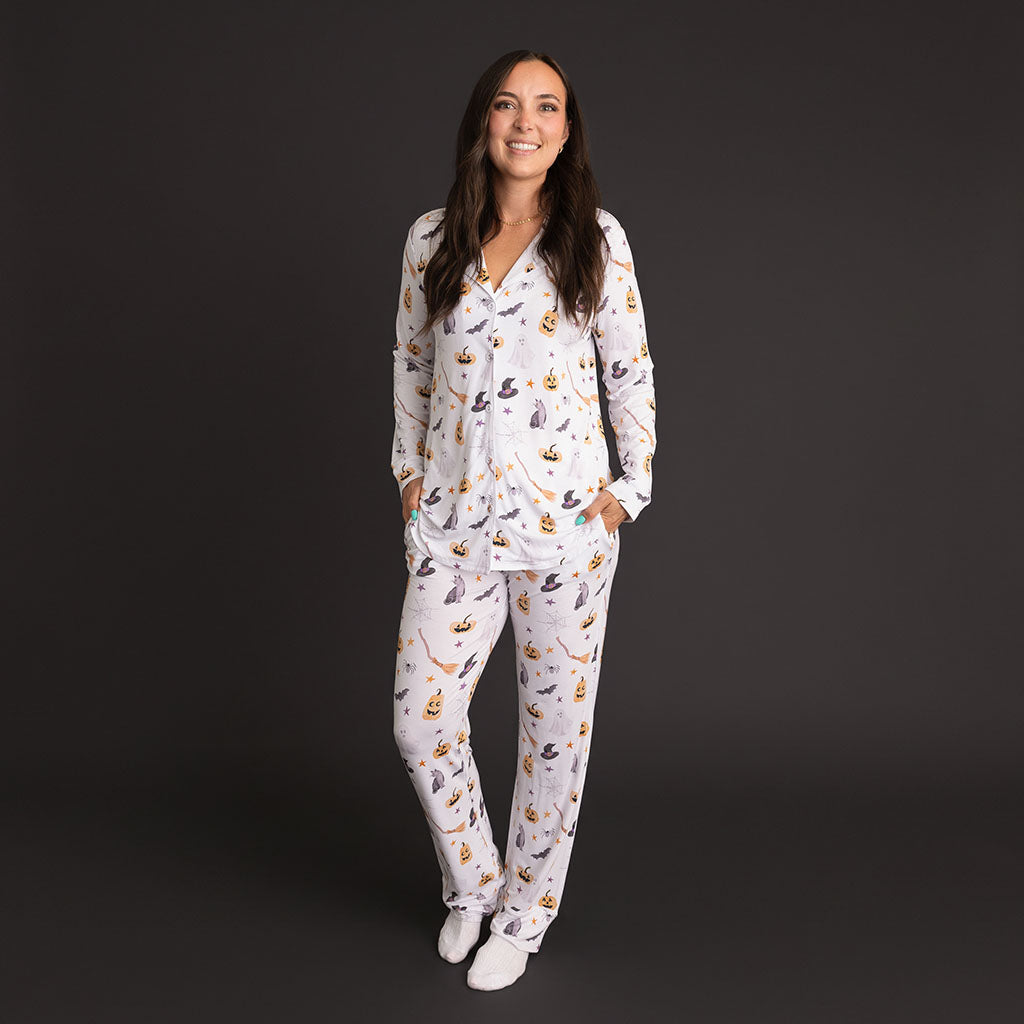 Woman standing wearing the Posh Peanut Irving Women's Luxe Pajama Pant Set.