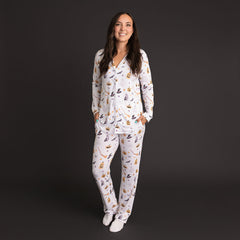 Woman standing wearing the Posh Peanut Irving Women's Luxe Pajama Pant Set.