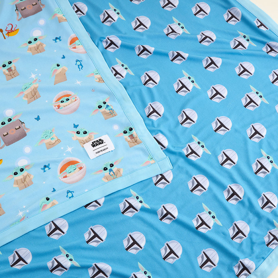 Two blue fabric swatches with 'Grogu' and 'The Mandalorian' on a light blue background.