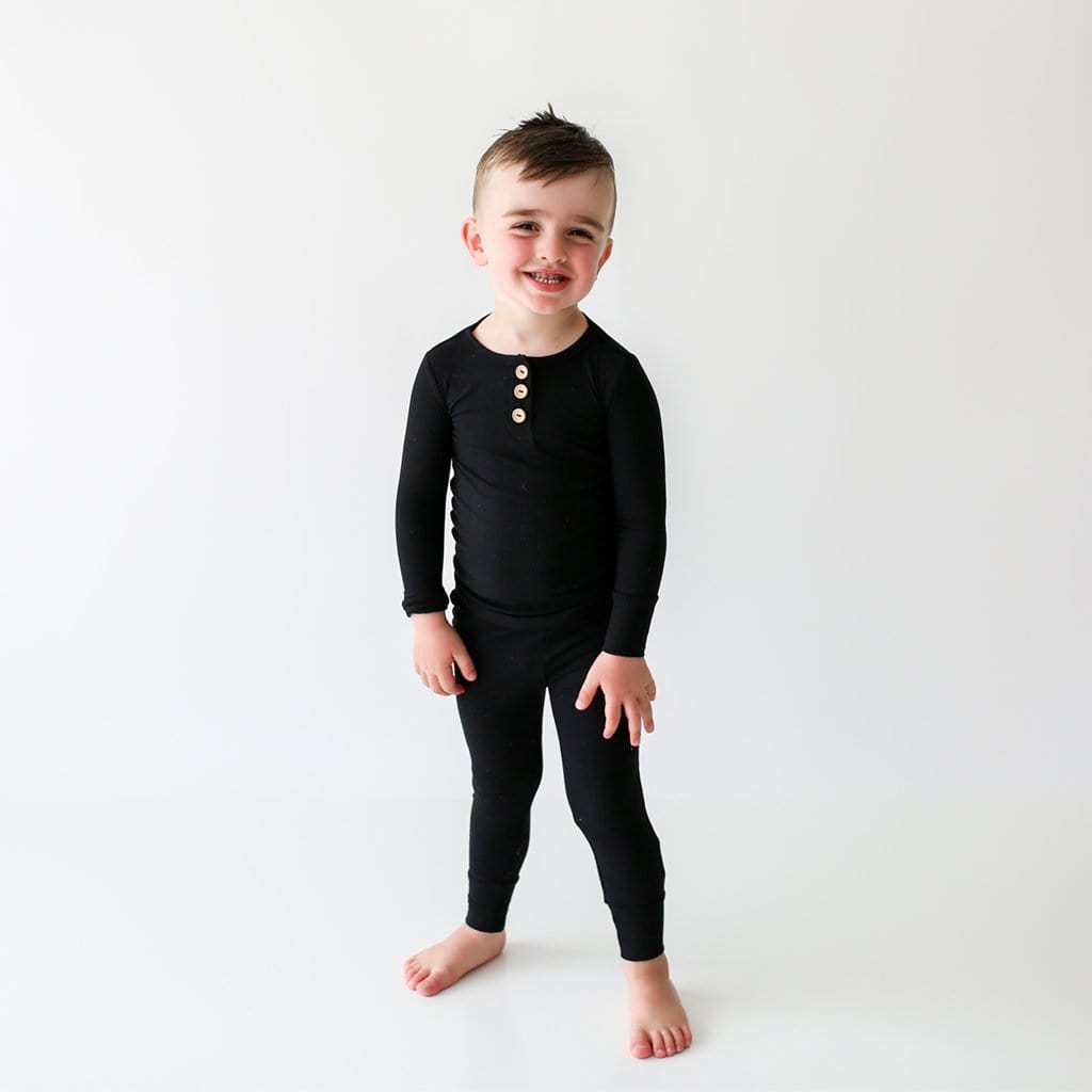 Kid wearing Black Ribbed Long Sleeve Henley Pajamas