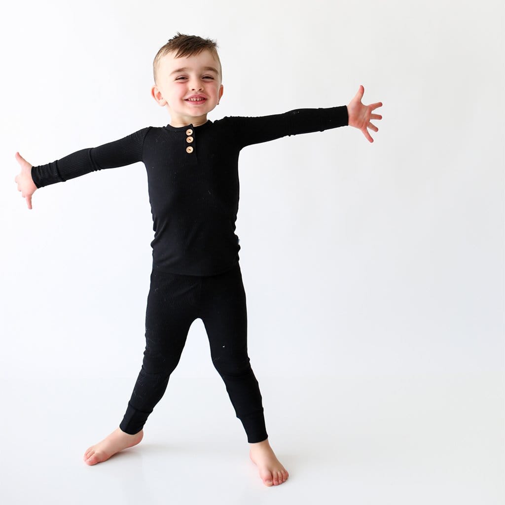 Toddler on Black Ribbed Long Sleeve Henley Pajamas