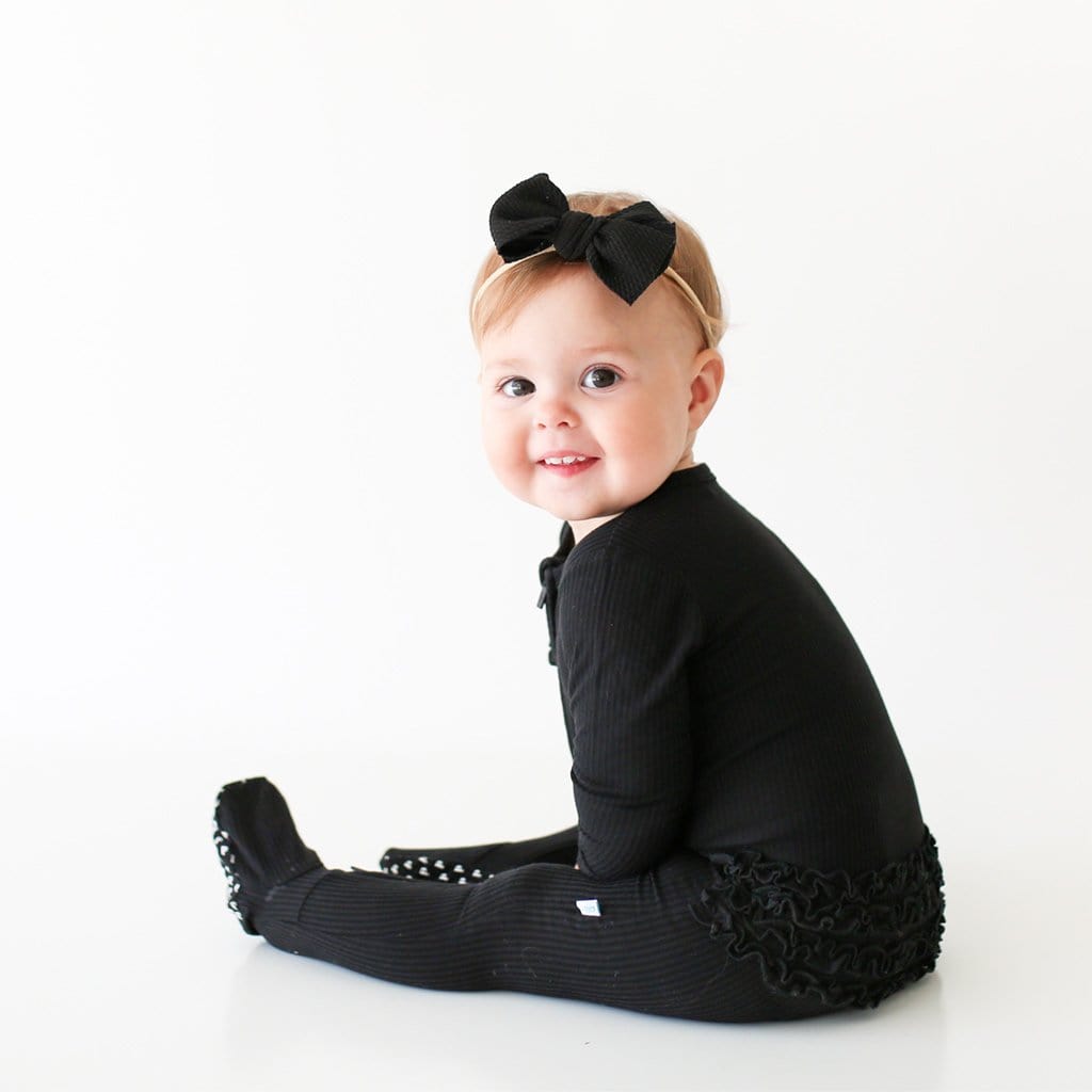 Black Ribbed Footie Ruffled Zippered One Piece back side