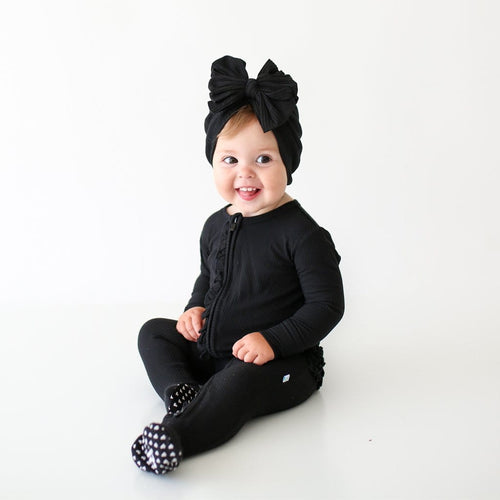 Black Ribbed Footie Ruffled Zippered One Piece side view